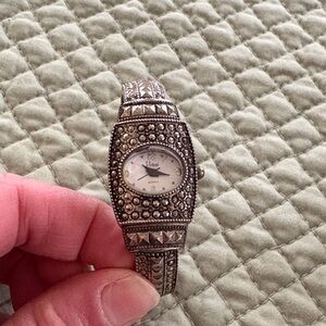 Vintage Vivani Silver Quartz Watch with Intricate Design